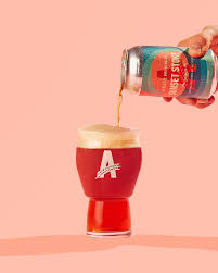 Athletic Brewing Sunset Stroke Non-Alcoholic Beer with Glass